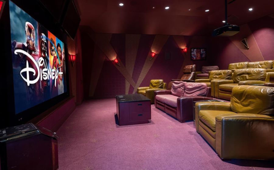 man drawing blueprints