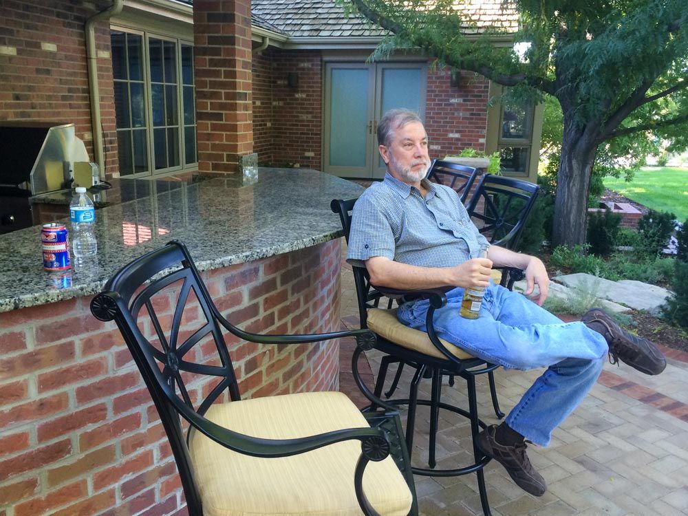 Man relaxing on chair outside