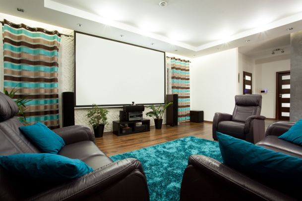 Home Theater room with blue rug